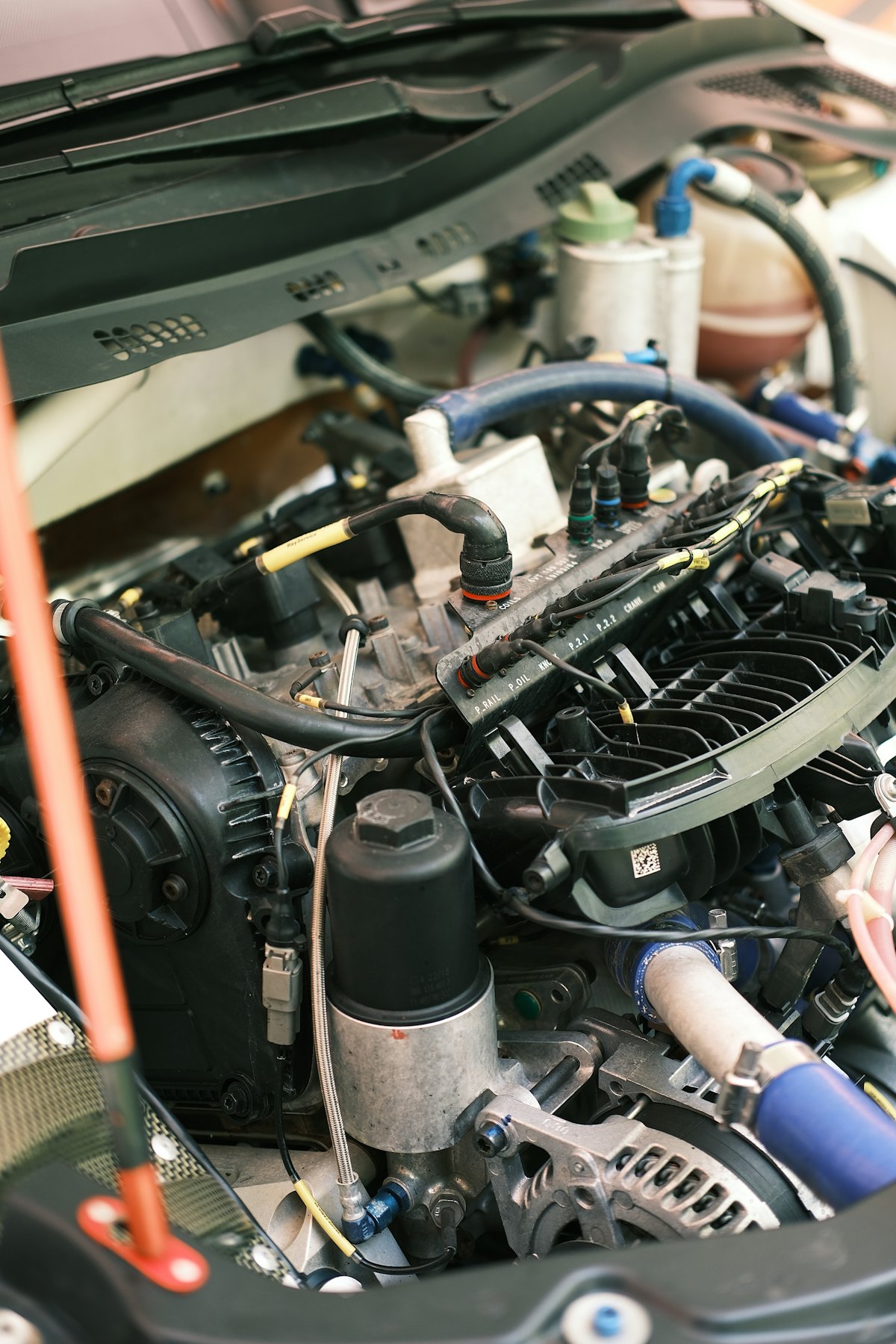 An engine bay open for diagnosis and repair